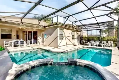 Image de Isabellas Luxury 6br Home Pool/Jacuzzi/Spa/GameRoom/Bbq Grill/ Mins from Disney