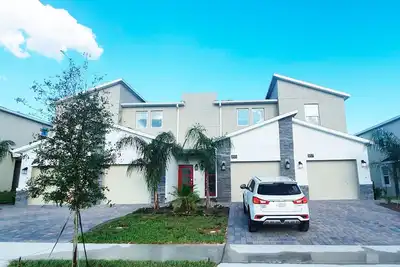 Image de Magnifique Condo 3Br 10 min Disney, Parc Aquatique Golf