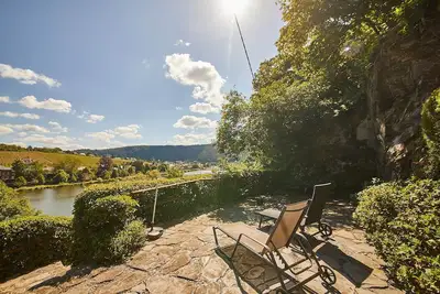 Image de The cozy vacation home with a fantastic view of the Moselle