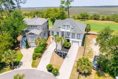 Image de Fairway to Heaven | Luxurious 6-Br Fripp Island Home with Marsh Views, Golf, Pools, and More!