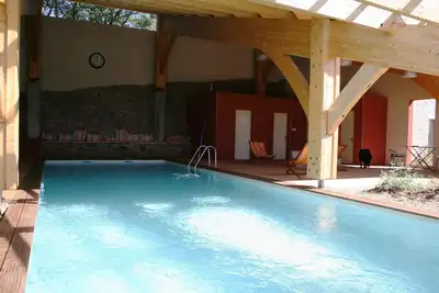 Image de Le Jardin dans le Chêne  Duplex 140 m2  4 à 8 pers. Piscine chauffée. Wifi