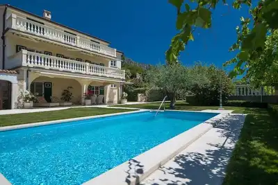 Image de VinodolSun Villa Mediterran; luxury for 14 pers. Pool, sauna, tennis, outdoor kitchen
