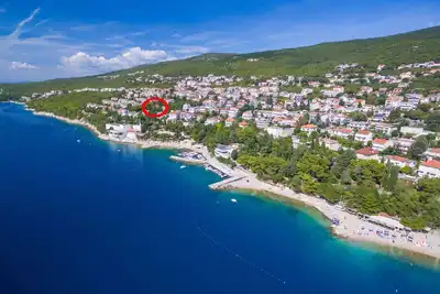 Image de Appartement de vacances avec vue sur la mer et le jardin