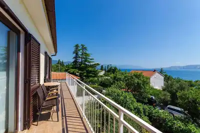 Image de Appartement de vacances avec climatisation et vue sur la mer