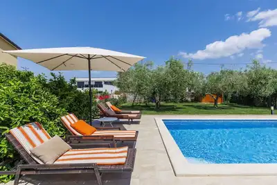 Image de Joli appartement avec piscine privée, Wifi, climatisation, Tv, terrasse et parking