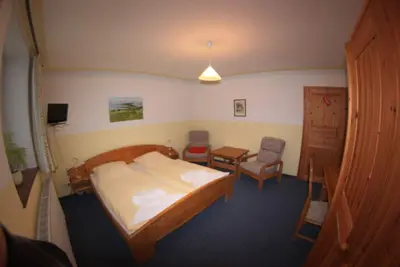 Image de Doppelzimmer 7 Erdgeschoß - Pension Inselidyll