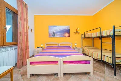 Image de Appartement dans villa 2-4 personnes avec grand jardin \"stella\"