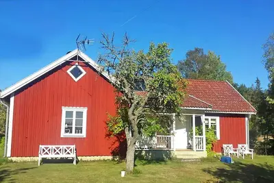 Image de Idyllic Swedish timber house for two families in picturesque surroundings