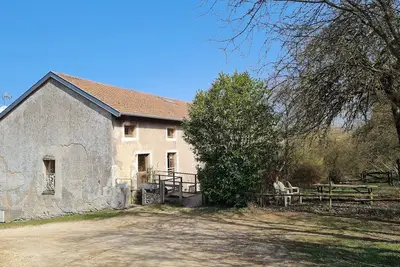 Image de Gîte chaleureux au bord d'un ruisseau avec grand jardin, proche Metz et Nancy