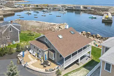 Image de Lever du soleil sur l'anse: Imprenable vue à 180 degrés de Pigeon Cove