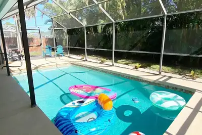 2-3 bedroom pool home just 5 minutes to Beach. Bicycles & beach gear included!