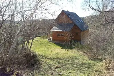 Charming wooden house in a green setting
