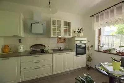 Image de Appartement de vacances avec air conditionné et balcon