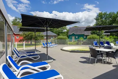 Image de Bel appartement dans une maison de vacances avec piscine, Wifi, Tv, terrasse, animaux admis, parking