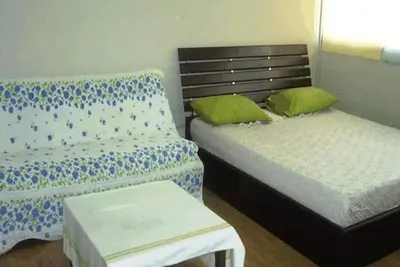Image de Chambre triple Challenger de la maison d'hôtes T8 Don Mueang