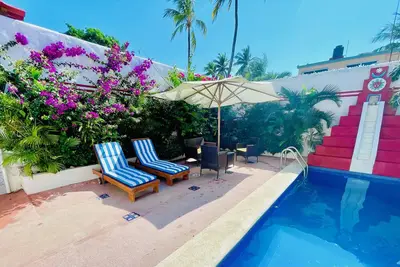 2 bed, 2 bath house w/ private pool, pyramid waterfall, short walk to beach.
