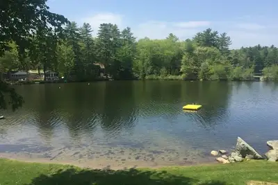 Image de Water front lake house with private beach area.