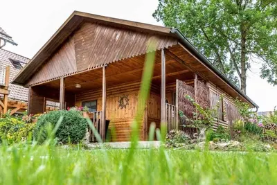 Image de Cozy log cabin (72 m2) with terrace and sunbathing lawn