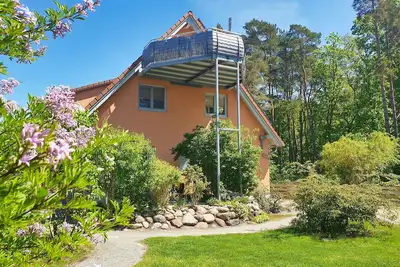 Image de Modern apartment no. 1 with terrace, sauna in the house, garden - vacation apartments by the forest