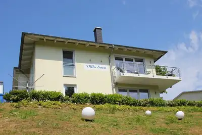 Image de Vacation apartment with fireplace and terrace, free Ahoi adventure pool - Villa Sara FeWo03