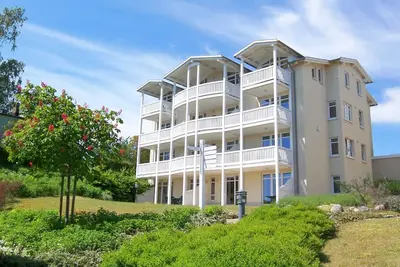 Image de Terrace, free use of the Ahoi adventure pool and sauna - Sea view apartment 12