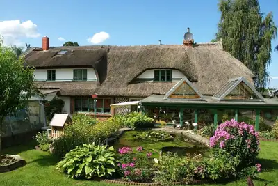 Image de Merveilleuse maison de vacances pour 4 personnes avec Tv, patio et parking