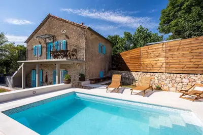Image de Maison de vacances avec piscine, climatisation et Internet