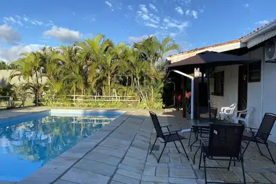 Image de House in Cananéia with swimming pool and barbecue area