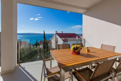 Image de Appartement de vacances avec climatisation et vue sur la mer