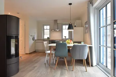 Image de 4-room vacation home with fireplace (max. 6 persons) - left - L7 Ferienhaus Strandhafer Ostseebad Rerik -