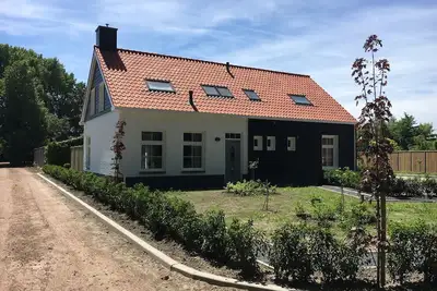Modern, luxurious holiday home in Oostkapelle, for six people with plenty of opportunities to play on the site