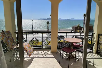 Image de Beachfront apartment with stunning sea and beach views with pool
