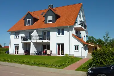 Image de Stylishly furnished apartment with balcony and garden