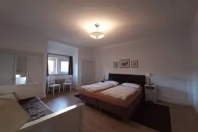 Image de Location-Supérieure-Salle de bain privée séparée-Vue ville-Typ E - Dachterrasse