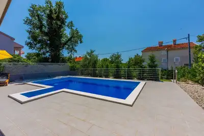 Image de Maison de vacances avec piscine extérieure
