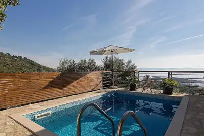 Image de Maison de vacances Makarska pour 1 - 5 personnes avec 2 chambres à coucher - Maison mitoyenne