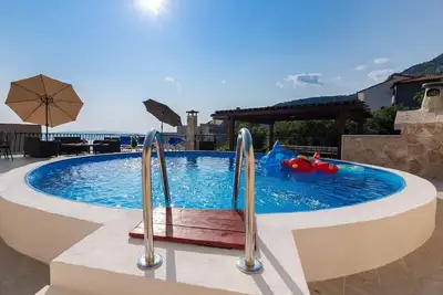 Image de Appartement de vacances Makarska pour 1 - 6 personnes avec 3 chambres à coucher - Maison de vacances