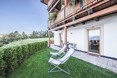 Image de Appartement de vacances \"Peterbühel Gfliererhof\" avec vue sur les montagnes, Wi-Fi et terrasse