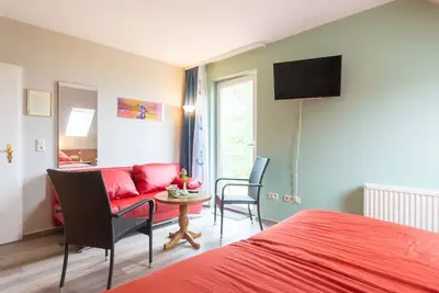Image de Ferienzimmer mit Balkon und Seeblick