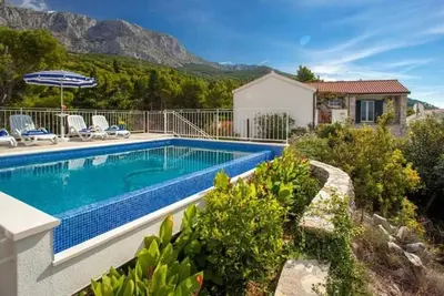 Image de Maison de vacances Tučepi pour 1 - 5 personnes avec 2 chambres à coucher - Maison de vacances