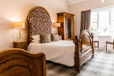 Image de Suite Junior-Famille-Salle de bain privée séparée-Vue sur Jardin-East Wing