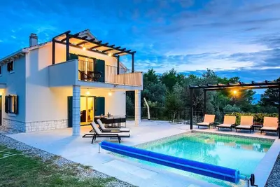 Image de Maison de vacances Zaostrog pour 1 - 6 personnes avec 3 chambres à coucher - Maison de vacances