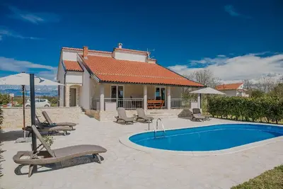 Image de Maison de vacances Privlaka pour 1 - 8 personnes avec 3 chambres à coucher - Maison de vacances