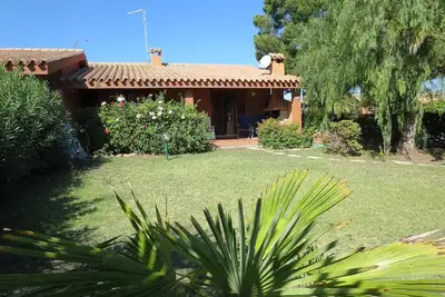 Image de Maison de vacances Costa Rei pour 1 - 6 personnes avec 2 chambres à coucher - Maison mitoyenne