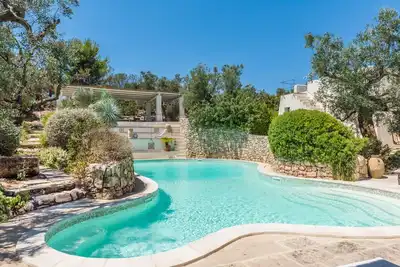 Image de Maison de vacances \"Tia Maria Country Inn - Bilocale 104\" avec piscine, terrasse et jardin