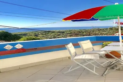 Image de maison de vacances avec une vue fantastique sur la mer à Almocageme/Colares