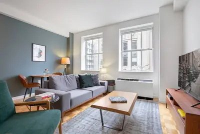 Image de Lux FiDi 1br w/ Resident's Bar, Golf Simulator, Pro Gym, by Blueground