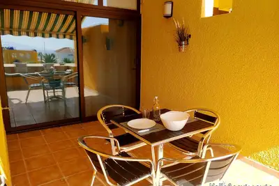 Image de Terrasse, vue mer, Wi-Fi, A/C, piscine, 50 mts. de la plage