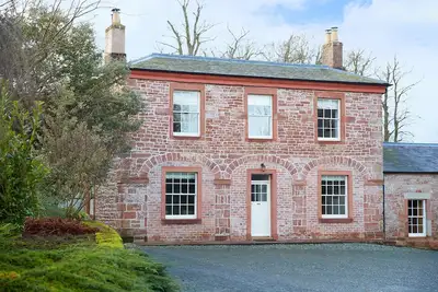 Image de Coach House is a stunning two bedroomed apartment