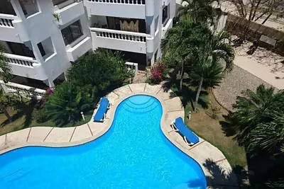 Image de Top-floor guest-friendly apartment in Sosua, pool/parking/Wi-Fi/Cable Tv